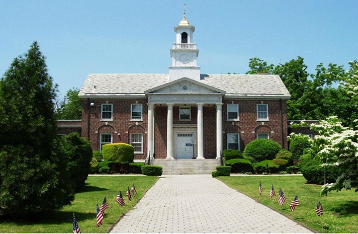 A large brick building with a clock tower on top of it