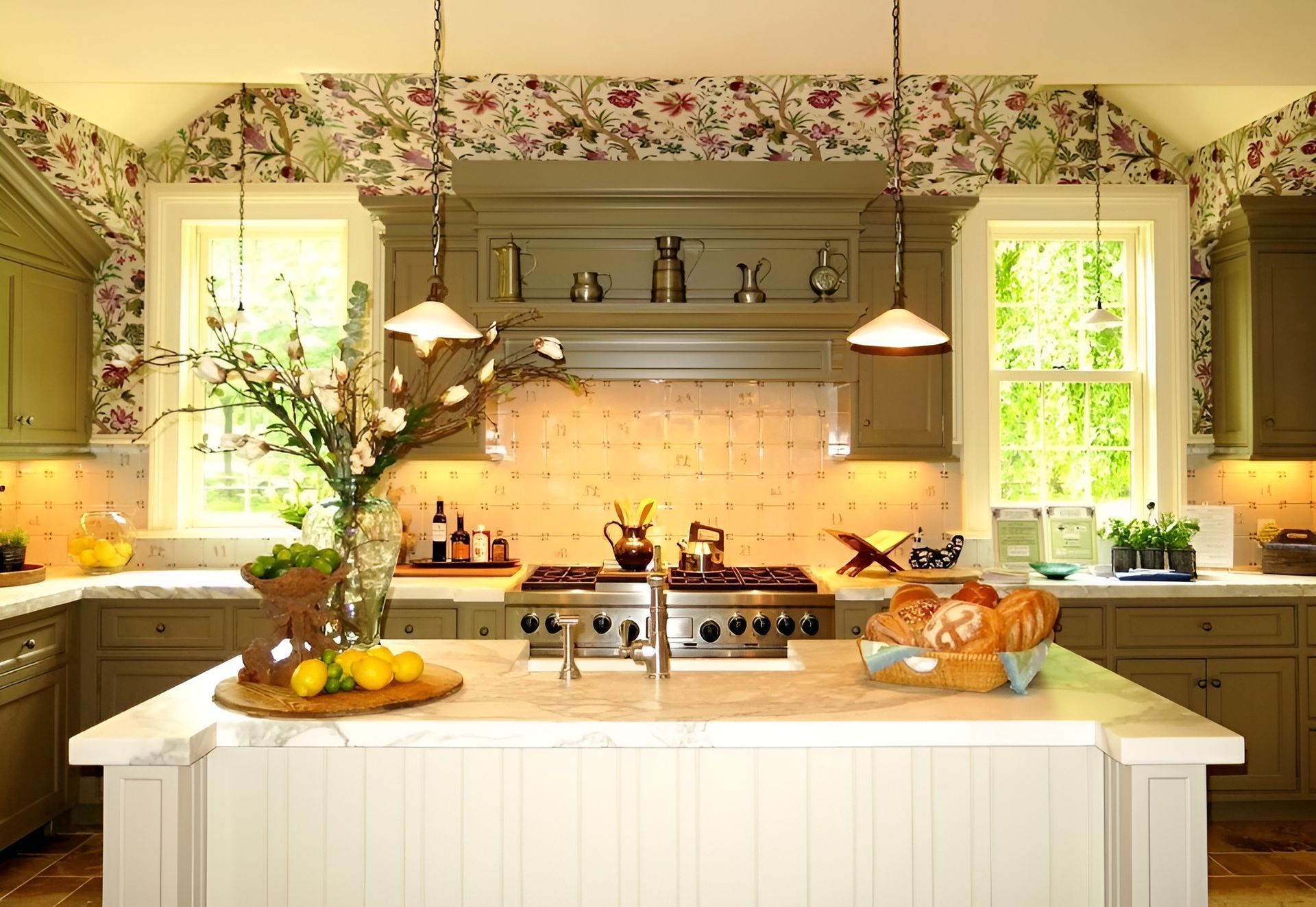 A kitchen with a large island and a stove top oven