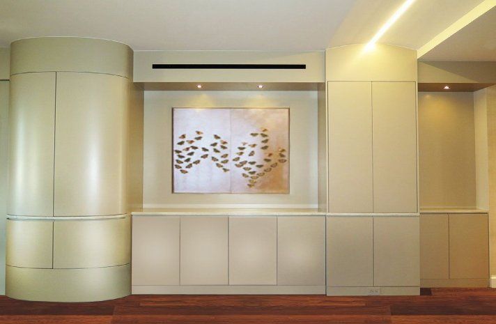 A room with a large picture on the wall