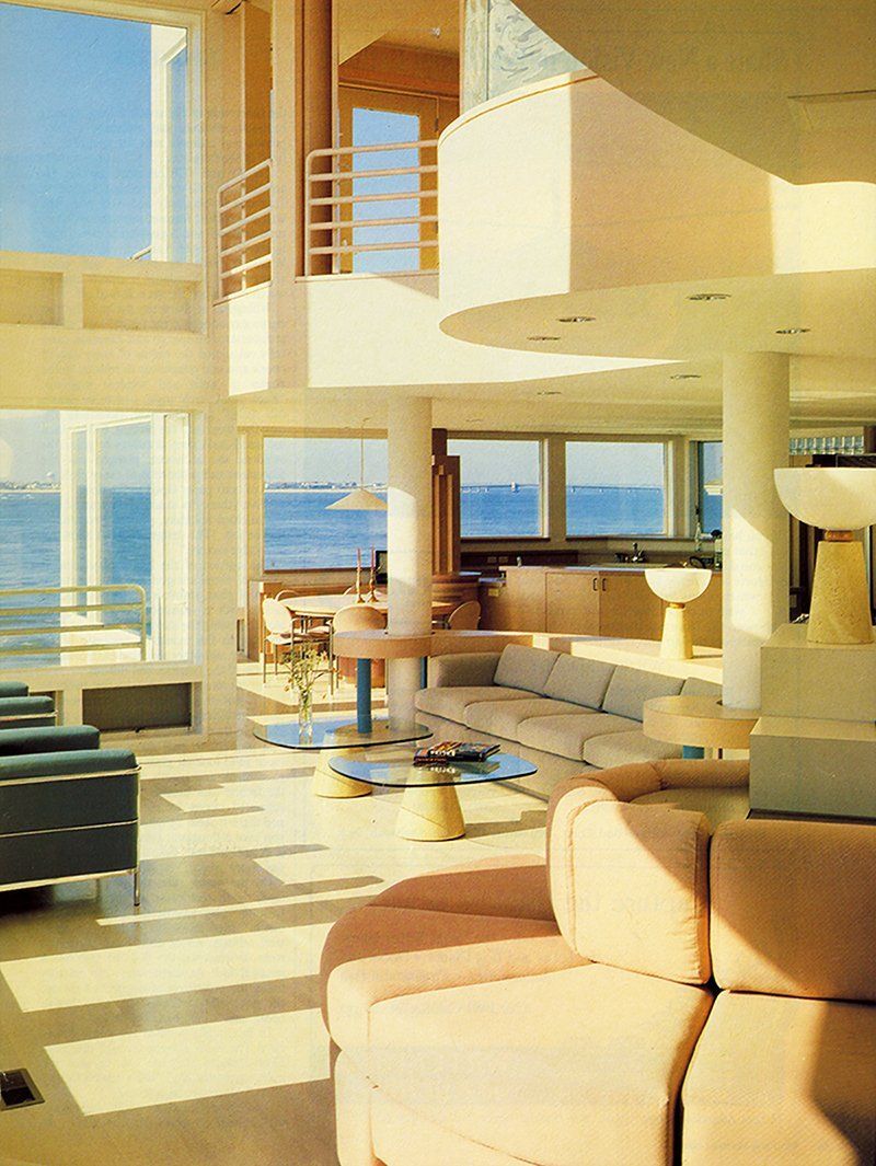 A living room with a view of the ocean