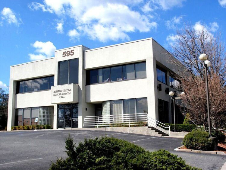 A large white building with the number 395 on it