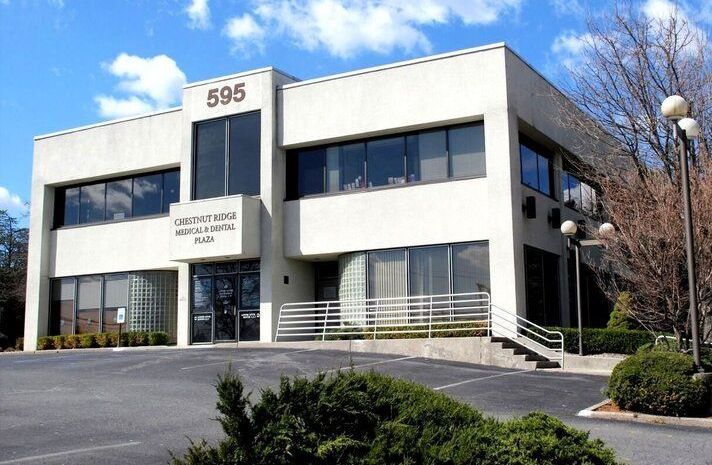 A large white building with the number 395 on it