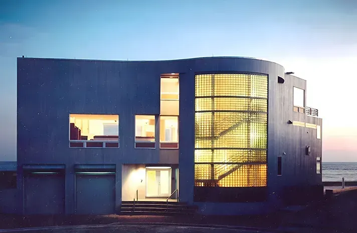 A large building with a lot of windows and stairs