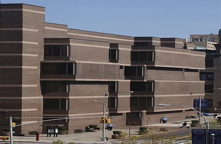 A large brick building with a lot of windows