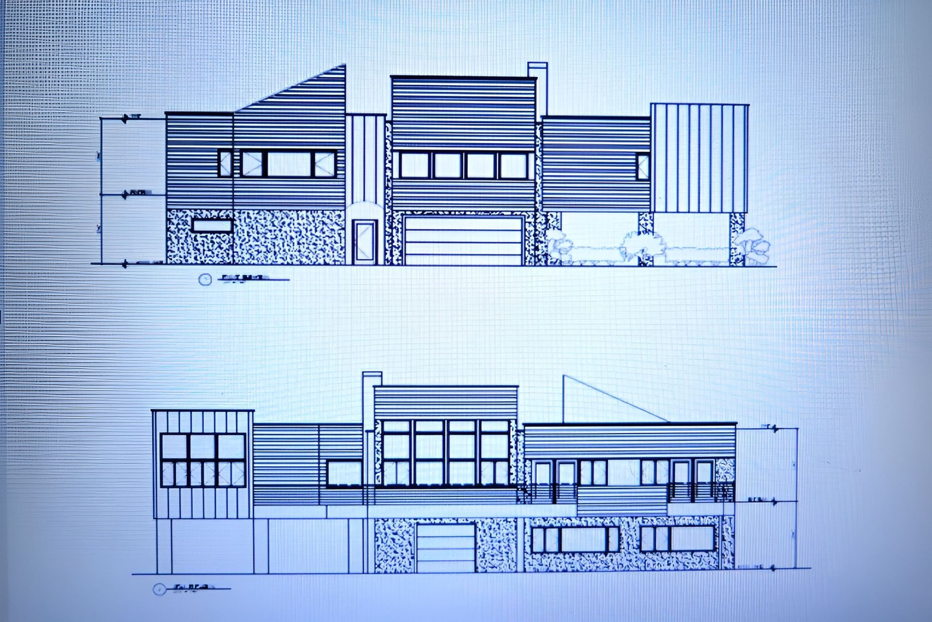 A blue and white drawing of a house with a lot of windows