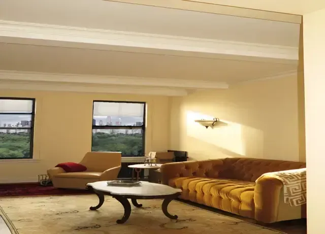 A living room with a couch and a coffee table