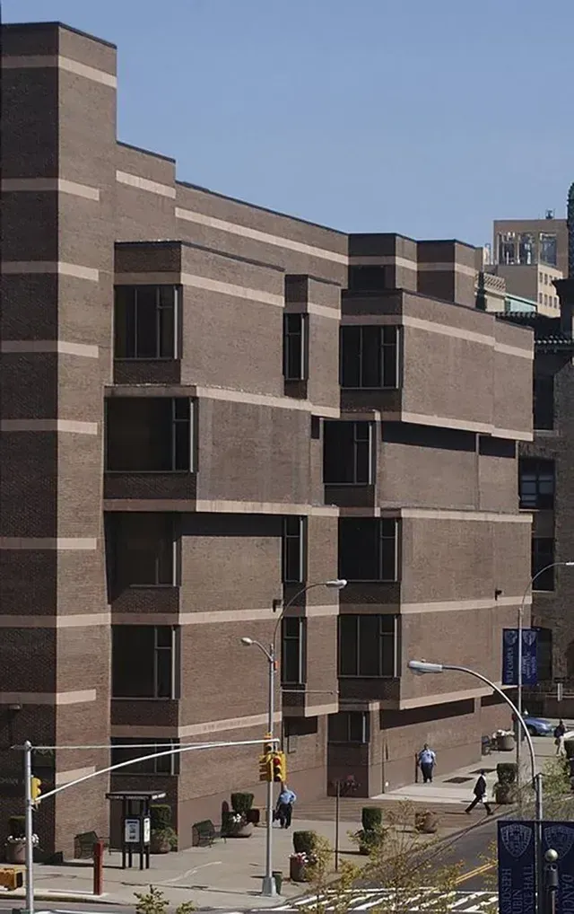 A large brick building with a lot of windows