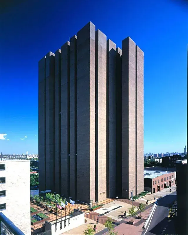 A tall building with a blue sky in the background