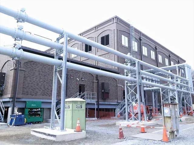A large building with a lot of pipes going through it.