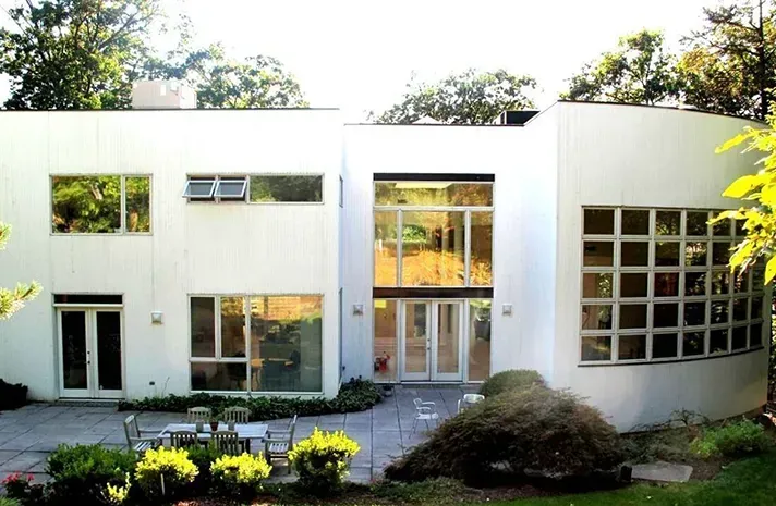 A large white house with a lot of windows