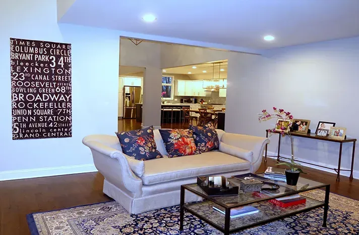 A living room with a couch and a coffee table