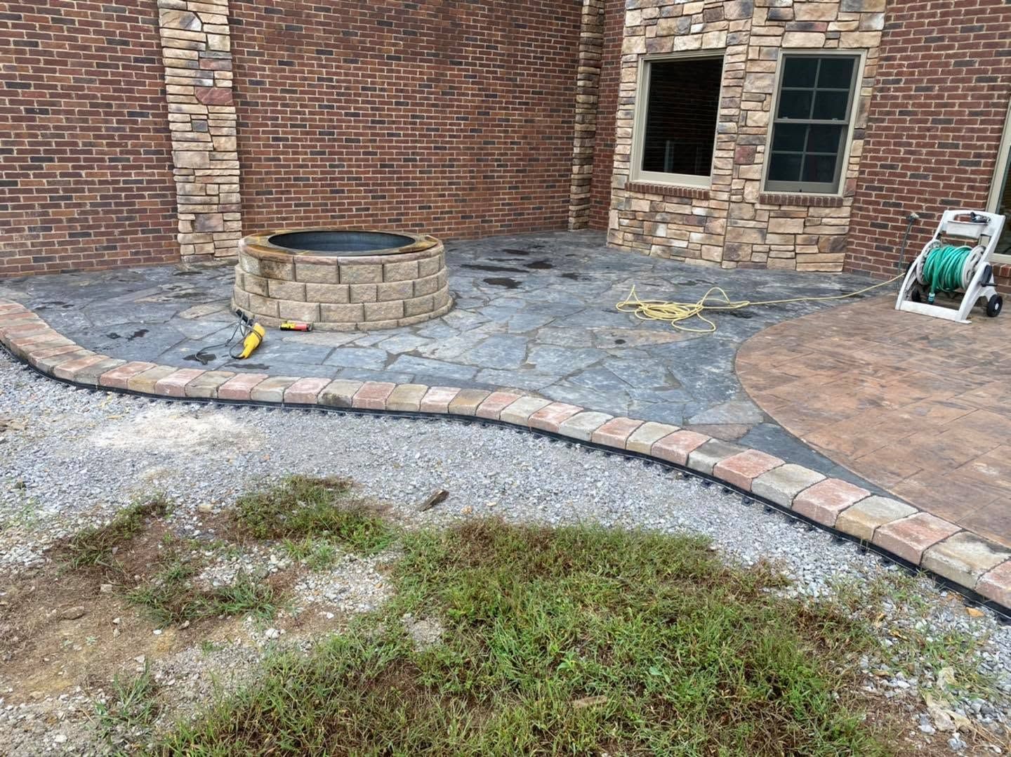 custom patio with fire pit