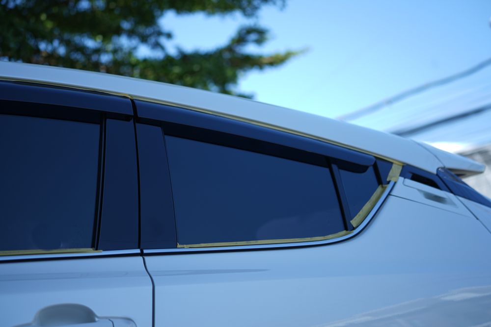 A Close up Of a White Car with Black Windows — Jetty Car Detailing Coffs Harbour in Coffs Harbour NSW