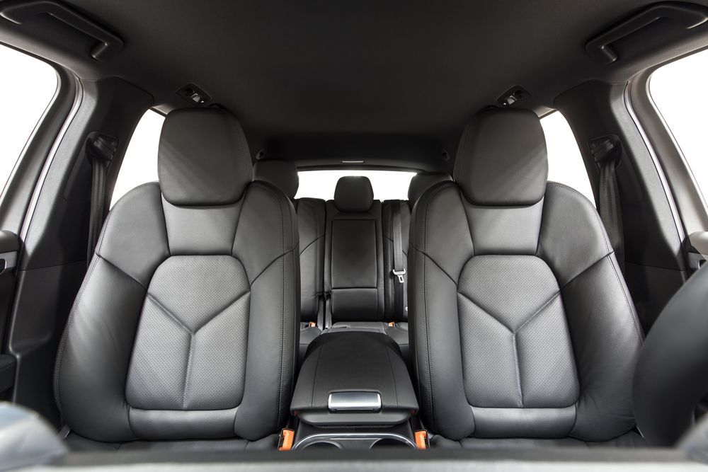 The Interior of A Car with Black Leather Seats and A White Background — Jetty Car Detailing Coffs Harbour in Coffs Harbour NSW