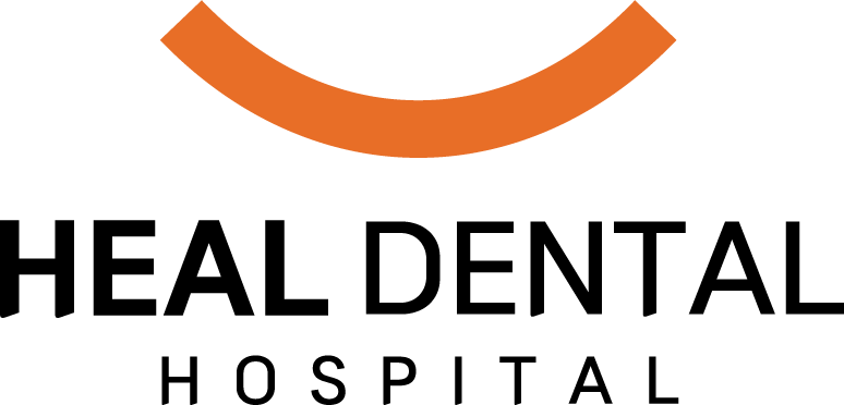 Logo of Heal Dental Clinic: an orange curved line above the words 