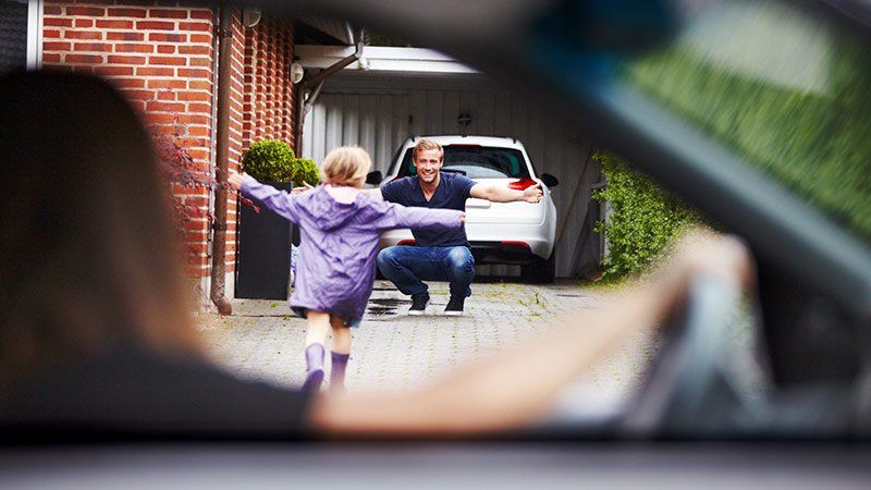 Small child running to her father