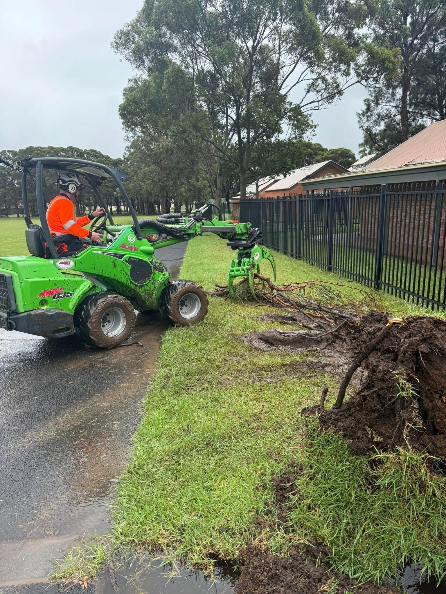 Mini Excavator Doing Tree Removal — Burnett Trees in Nowra, NSW