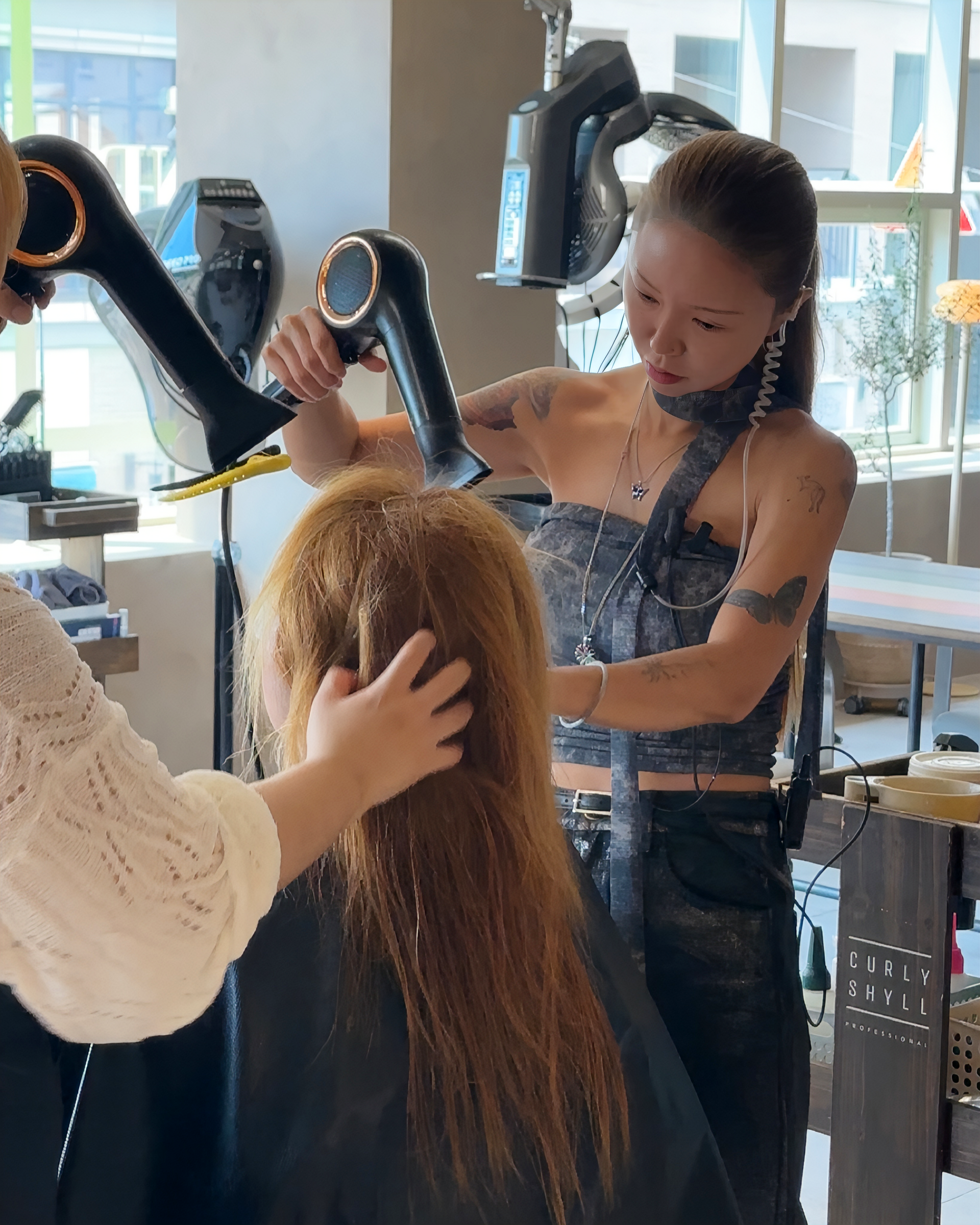 Korean tassel cut style at Bymond Gwangalli featuring face-framing layers