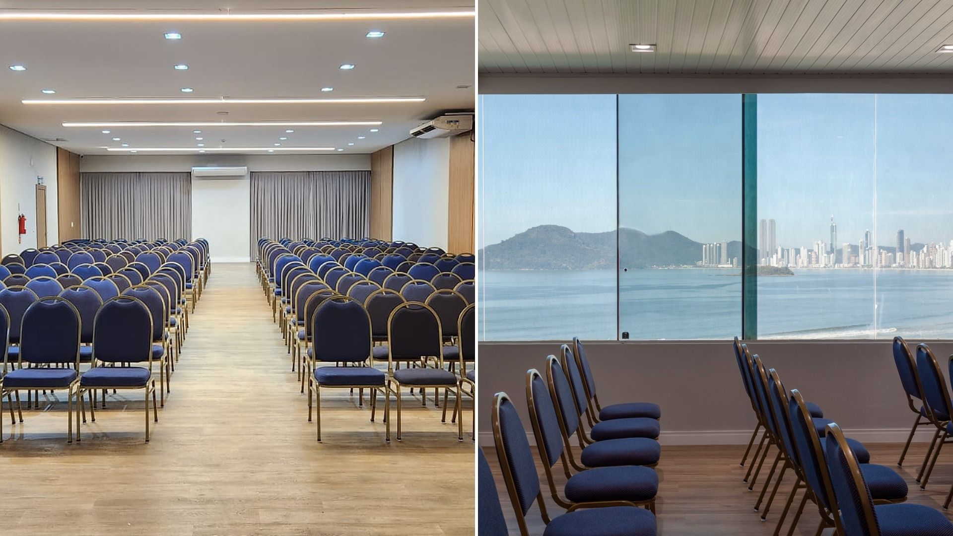 Sala de conferências com filas de cadeiras azuis e uma vista da água e do horizonte da cidade pela janela