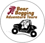 A logo for bear bogging adventure tours with a dog in a buggy.