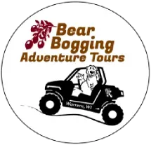A logo for bear bogging adventure tours with a dog in a buggy.