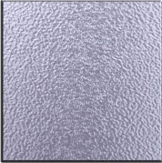 Close-up of a light gray textured surface with a subtle rippled pattern.