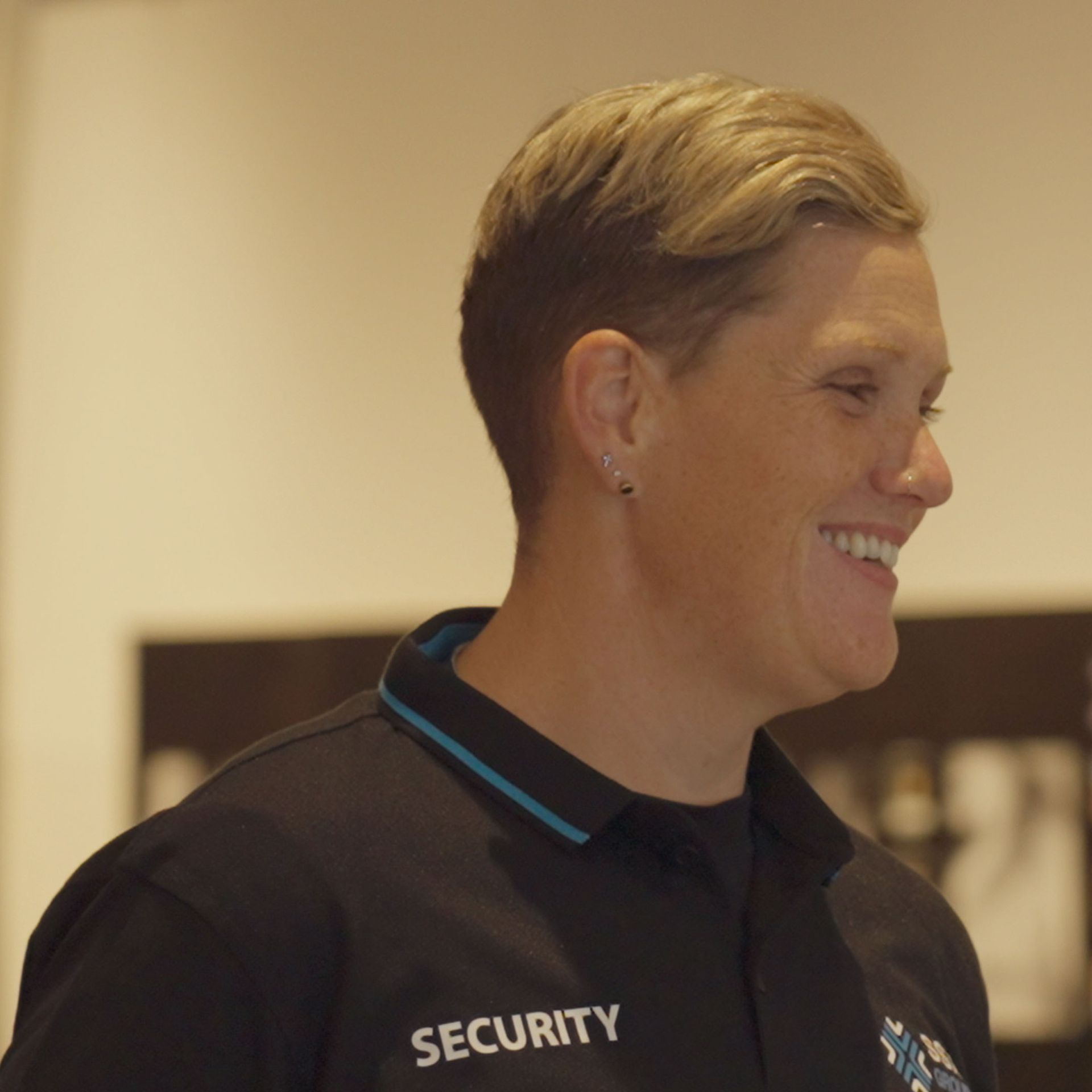 A SSX Group security guard with smiling face