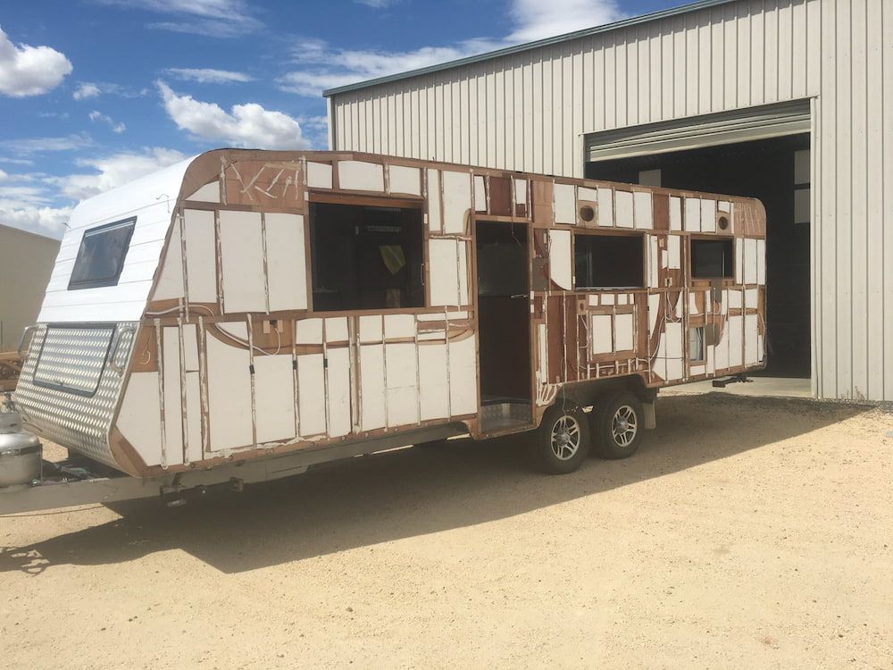 A Trailer Is Being Built In Front Of A Building — Posties Caravans Boats Small Engines Inverell In Moree, NSW