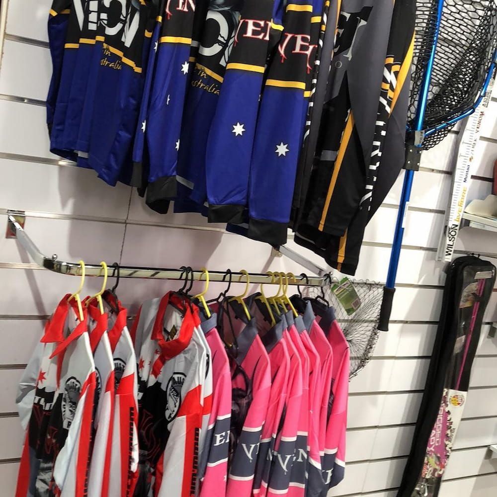 A Bunch Of Shirts Hanging On A Rack — Posties Caravans Boats Small Engines Inverell In Moree, NSW