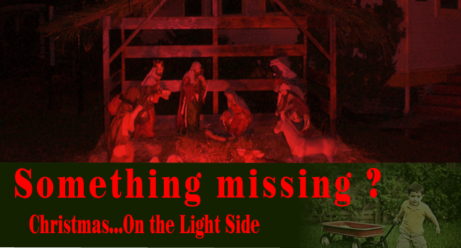 Manger and nativity scene with a little boy and his wagon