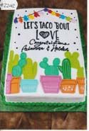A cake with cactus on it that says `` let 's taco bout love ''.