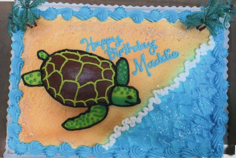 A birthday cake for maddie with a sea turtle on it