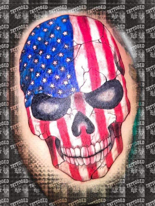 A skull with an american flag painted on it.
