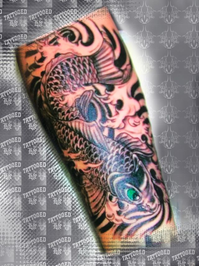 A tattoo of a fish on a person 's arm