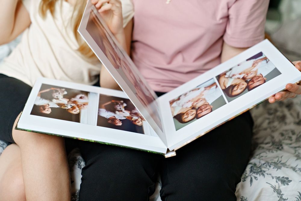 A black and white photo of a family posing for a picture