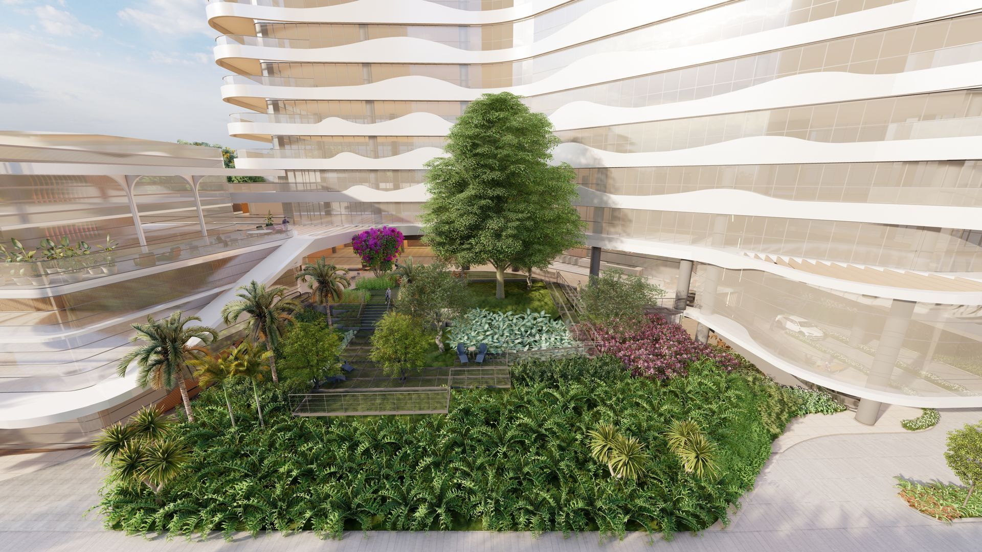 Jardim com vegetação exuberante e uma variedade de plantas, tendo como pano de fundo um edifício moderno.