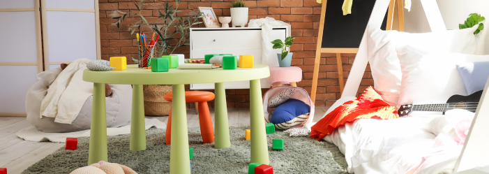 Interior of Messy Children's Room with Bed, Scattered Clothes and Toys