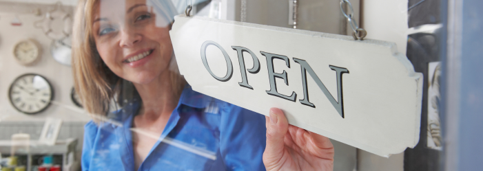 small business owner opening shop