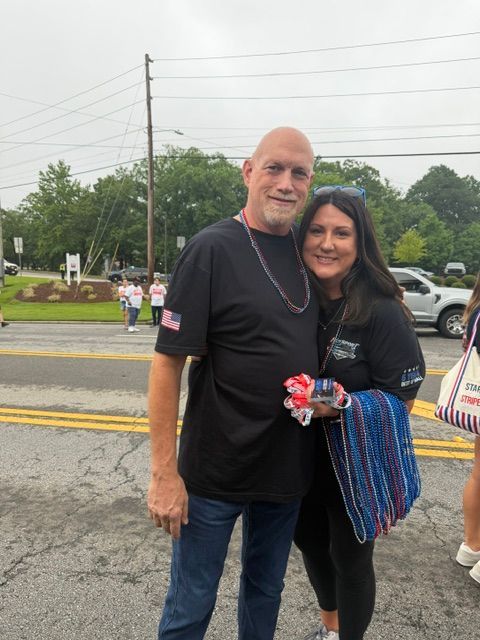 Two people standing together | Pro Import Automotive Service and Repair