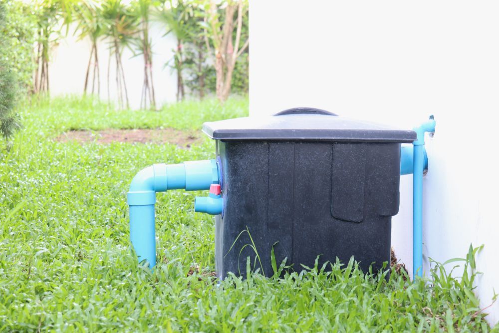 Grease Traps Box on the Ground Backyard Kitchen — Liquid Waste Disposal in Port Macquarie, NSW