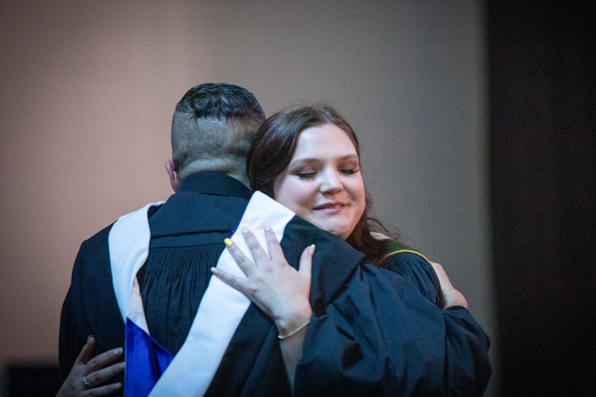 Two people hugging
