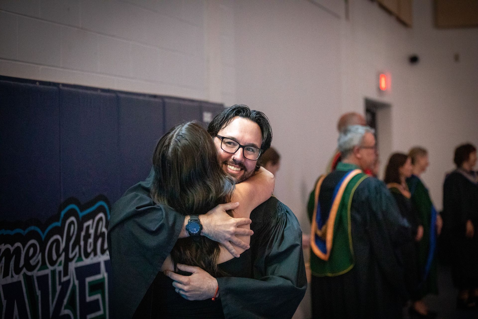 Nipissing University graduate with their family