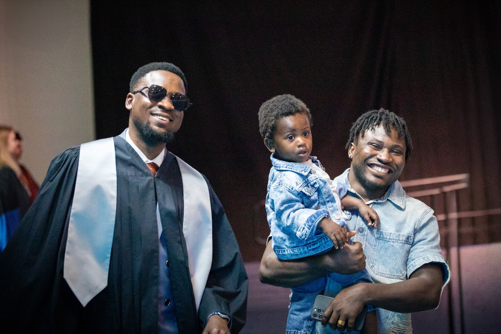Nipissing University graduate with their family