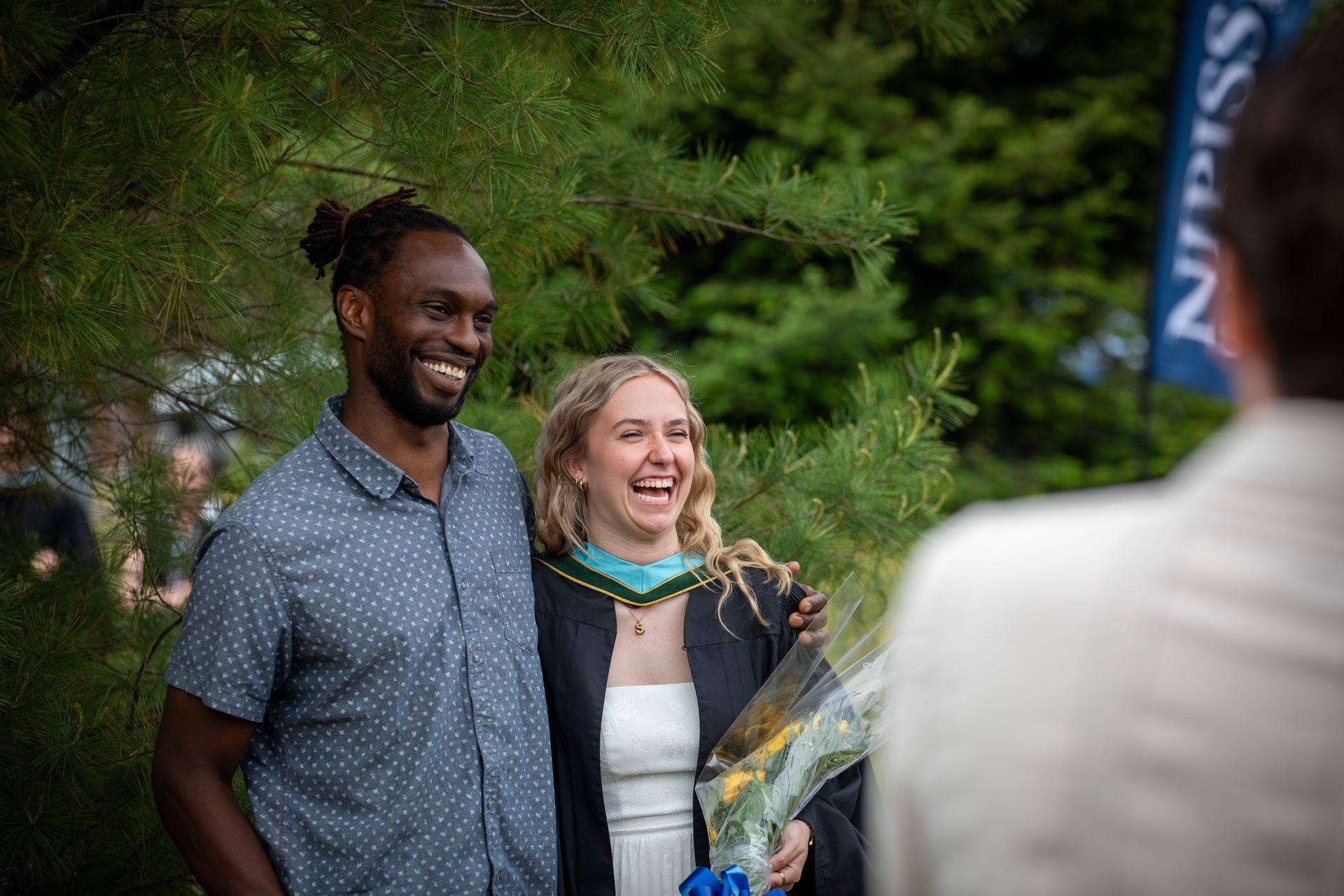 Nipissing University graduate with their family