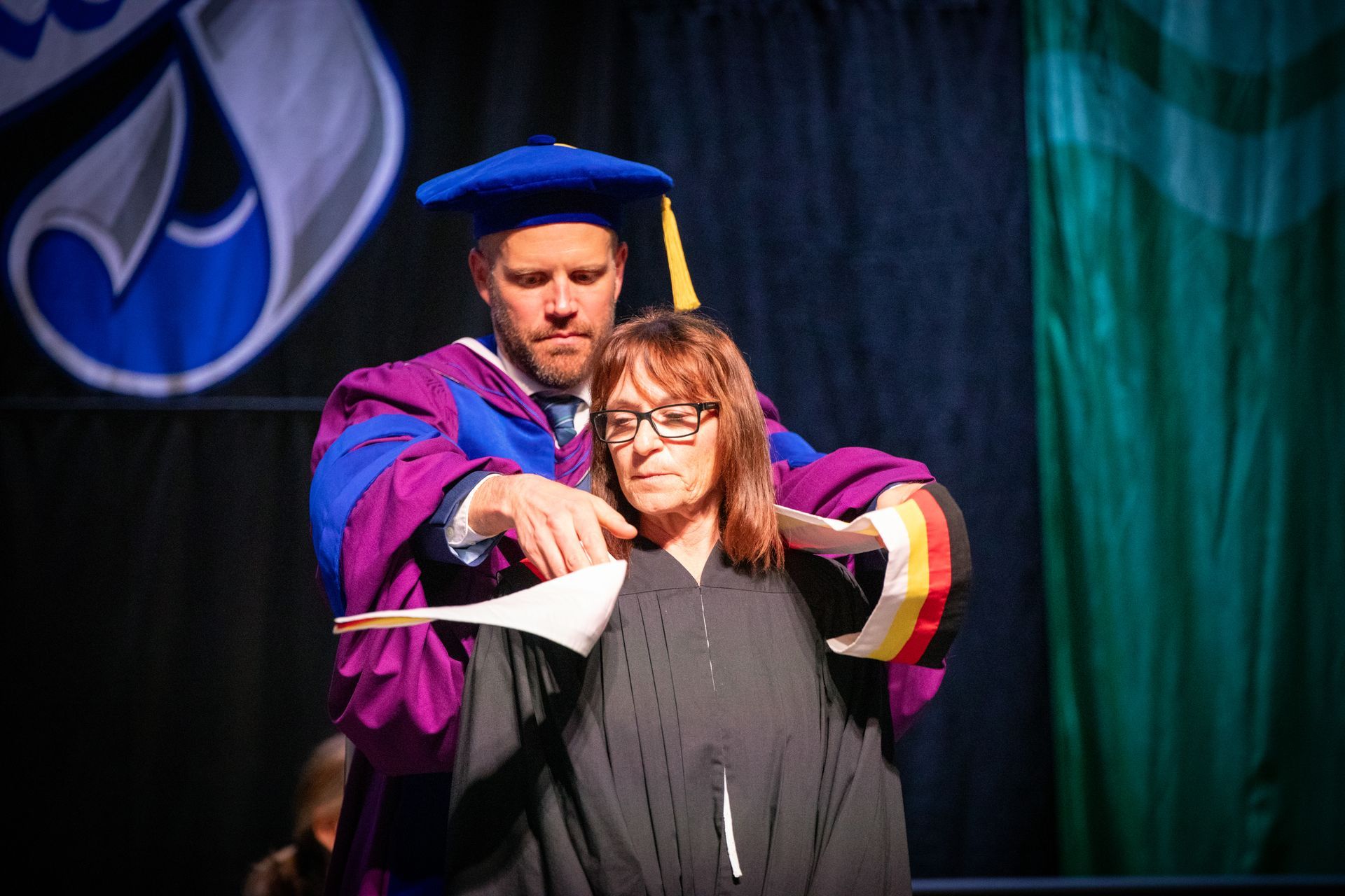 People on stage during Nipissing University Convocation 2026