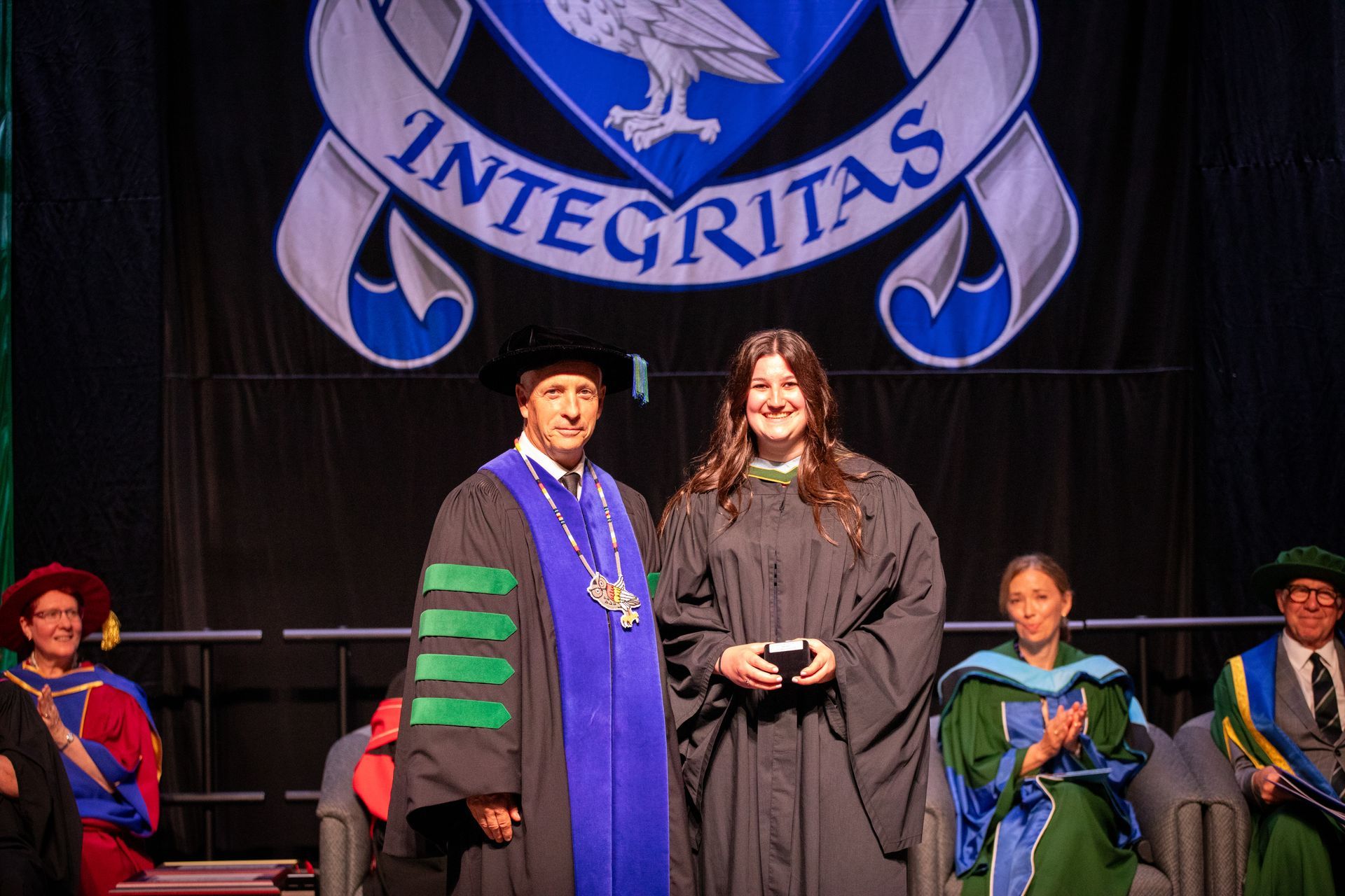 People on stage during Nipissing University Convocation 2026