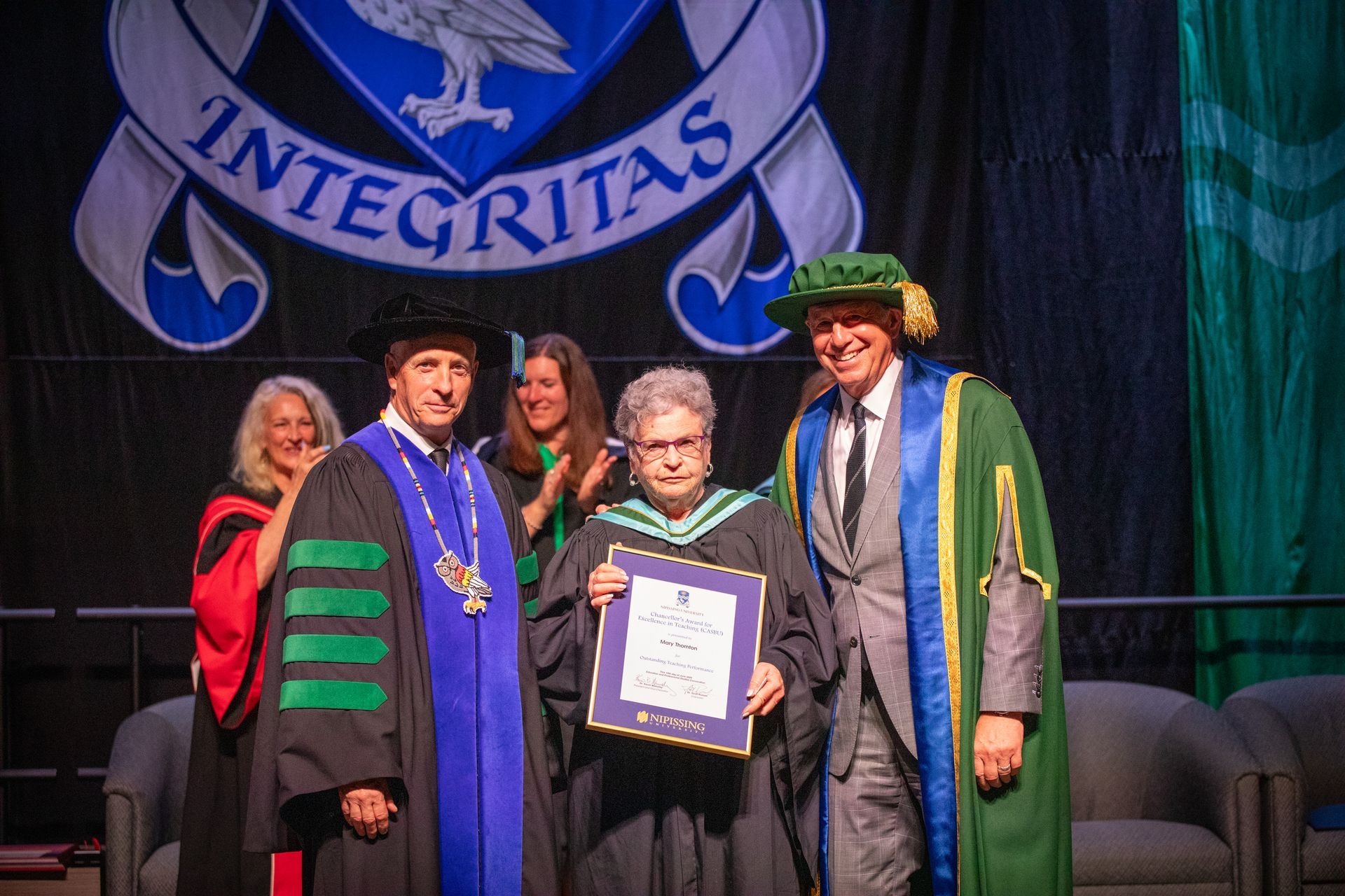 People on stage during Nipissing University Convocation 2026