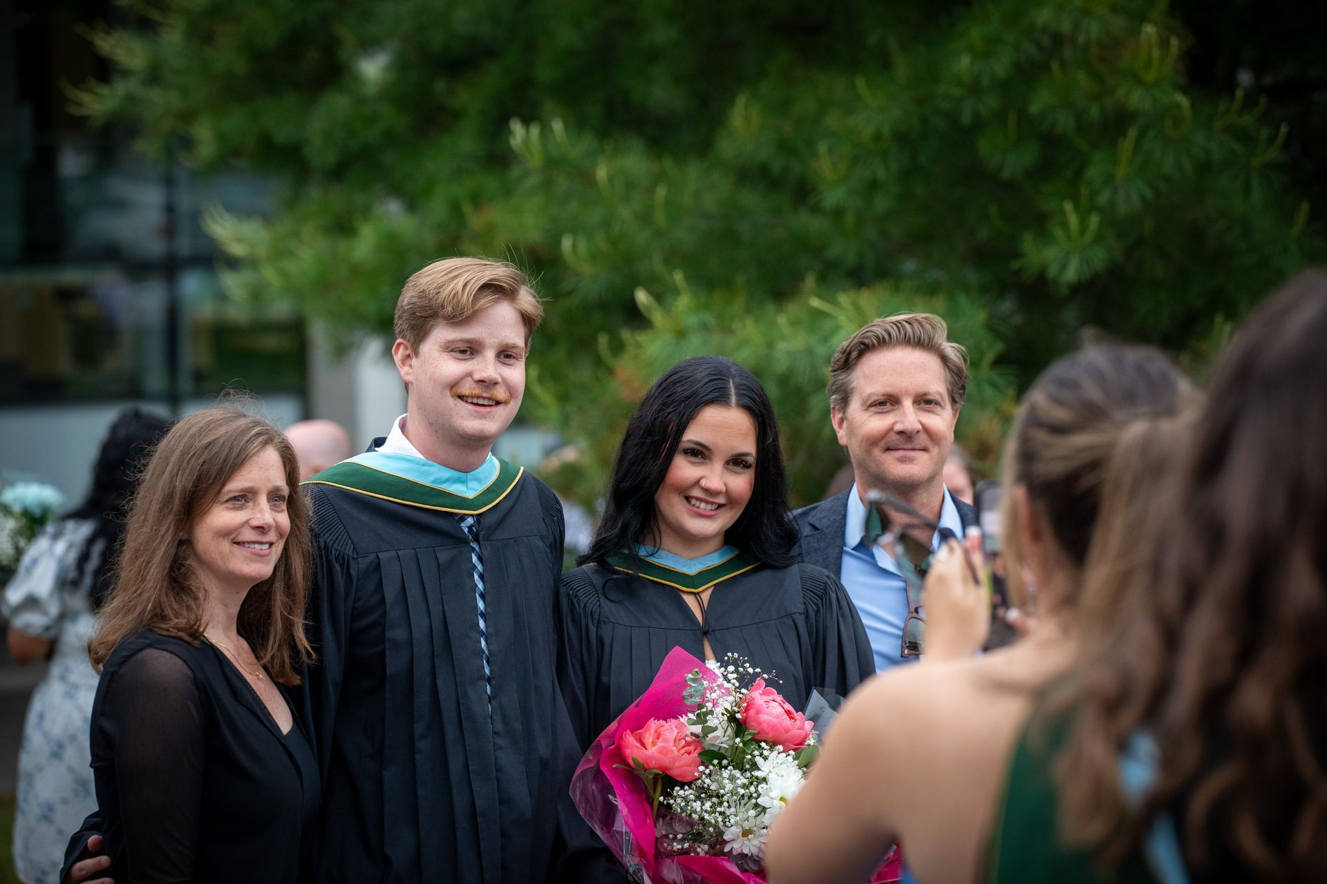 Nipissing University grads with their family