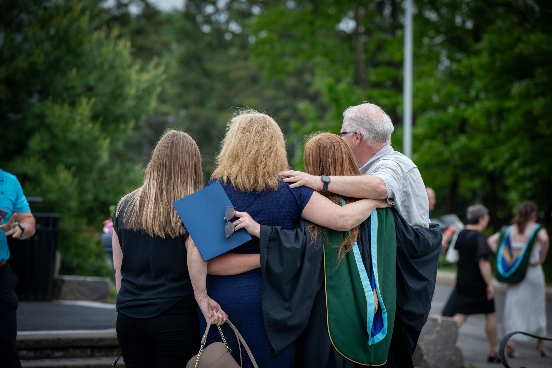Nipissing University graduate with their family