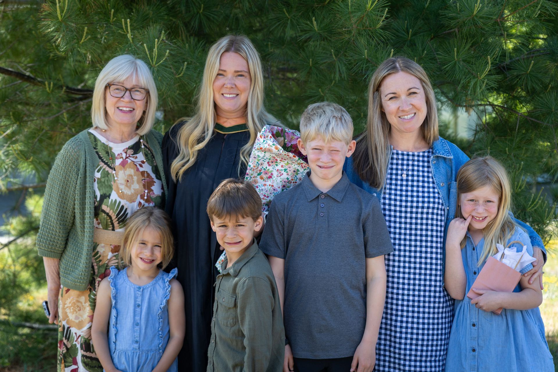 Nipissing University graduate with their family